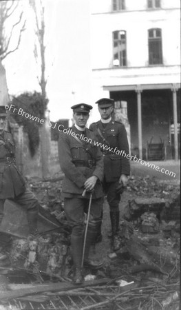 BOMB DAMAGE WITH CHAPLAIN SCANNELL AND SELF